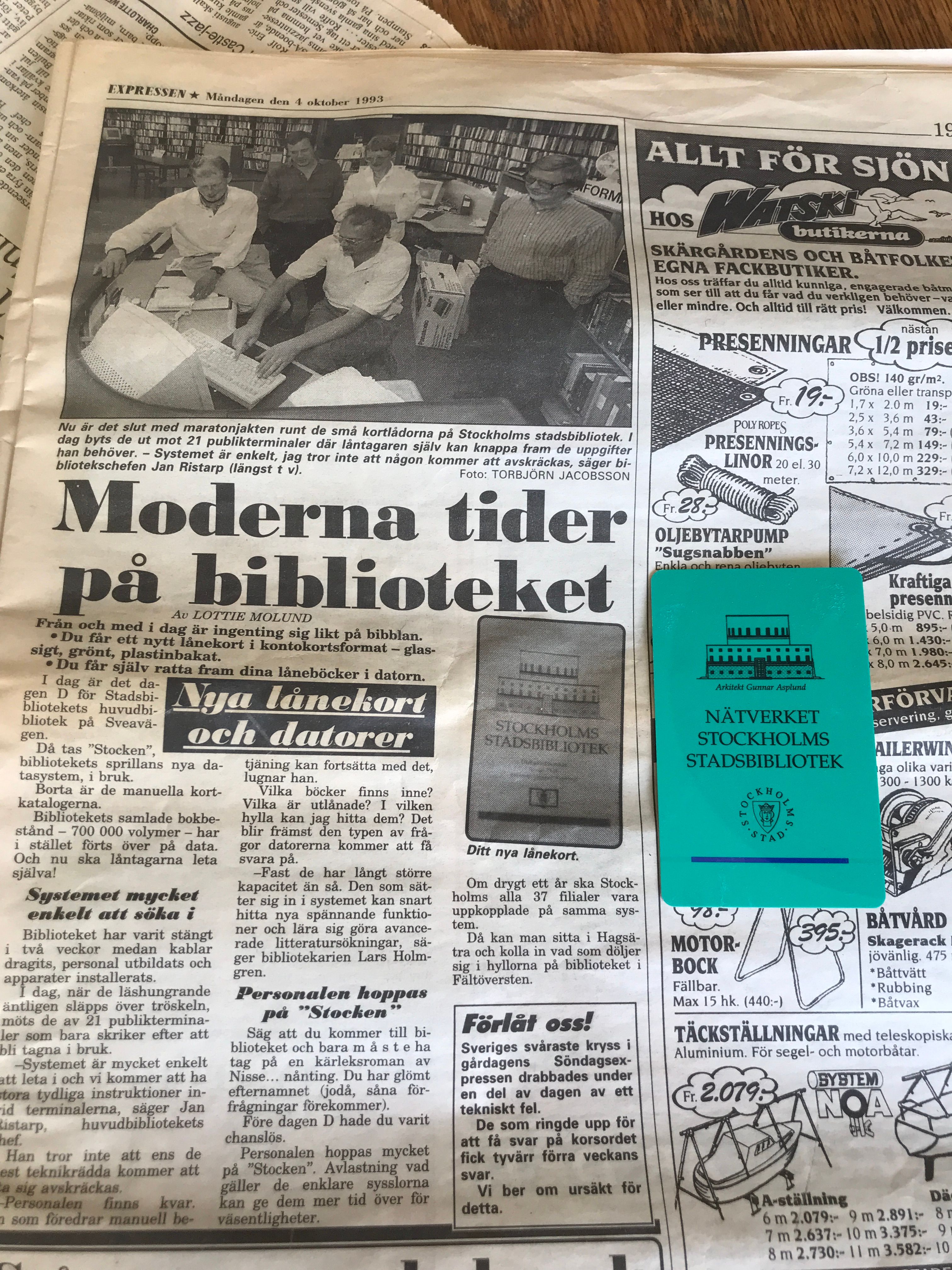 Foto på artikel om bibliotekets nya lånekort
