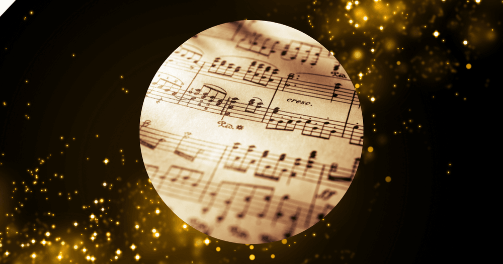 Ett notblad på en glittrig bakgrund