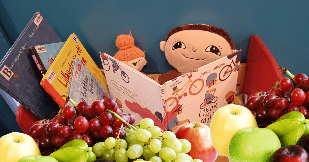 Alfonsdocka, bilderböcker och frukt